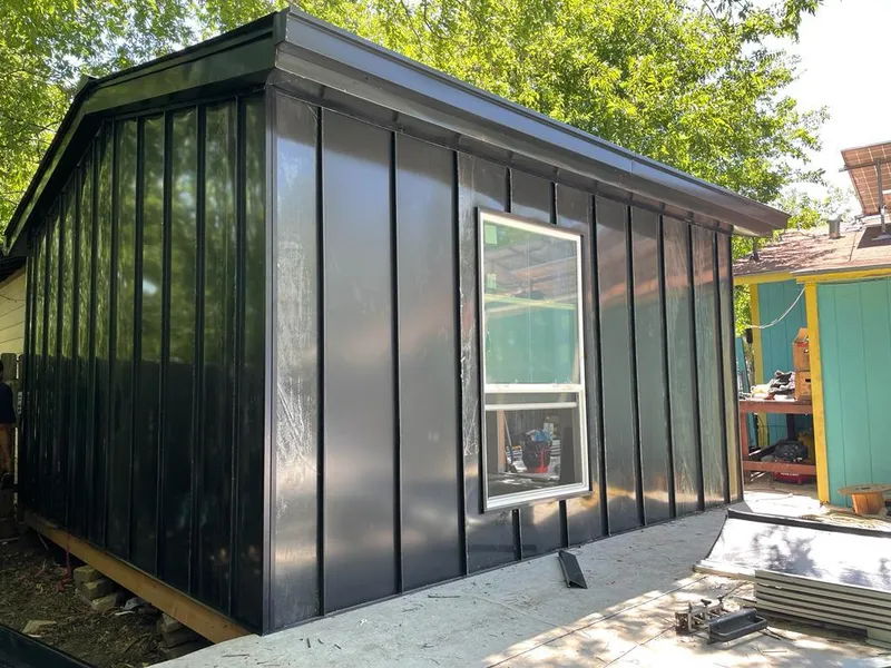 Black standing seam metal wall panels for Metal Roof Installation in Ridgefield