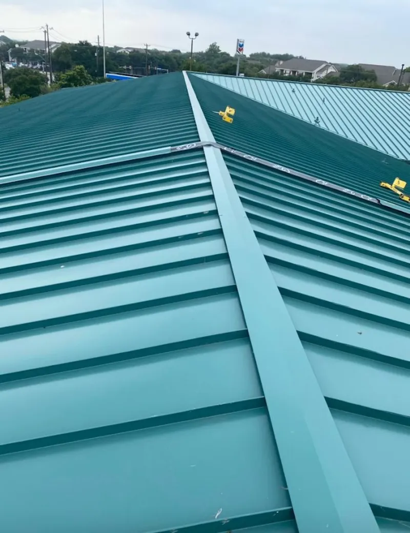 Green commercial metal roof ridge and valley for Metal Roof Repair in Ridgefield